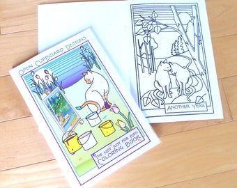 May include: A coloring book titled "The Not Just for Kids Coloring Book" with a white cat painting on a canvas. The cover features a blue and green background with a white cat and paint buckets. The back of the book shows a black and white illustration of two cats in a forest setting with the text "Another Year".