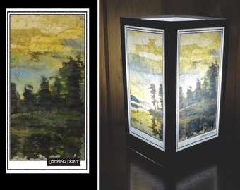 May include: A rectangular lamp with a watercolor landscape scene of trees and a lake. The lamp is made of wood and has a white frame. The scene is titled "Listening Point".