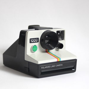 Polaroid 1000 Land Cámera green shutter button includes original box and original book instruccions image 4