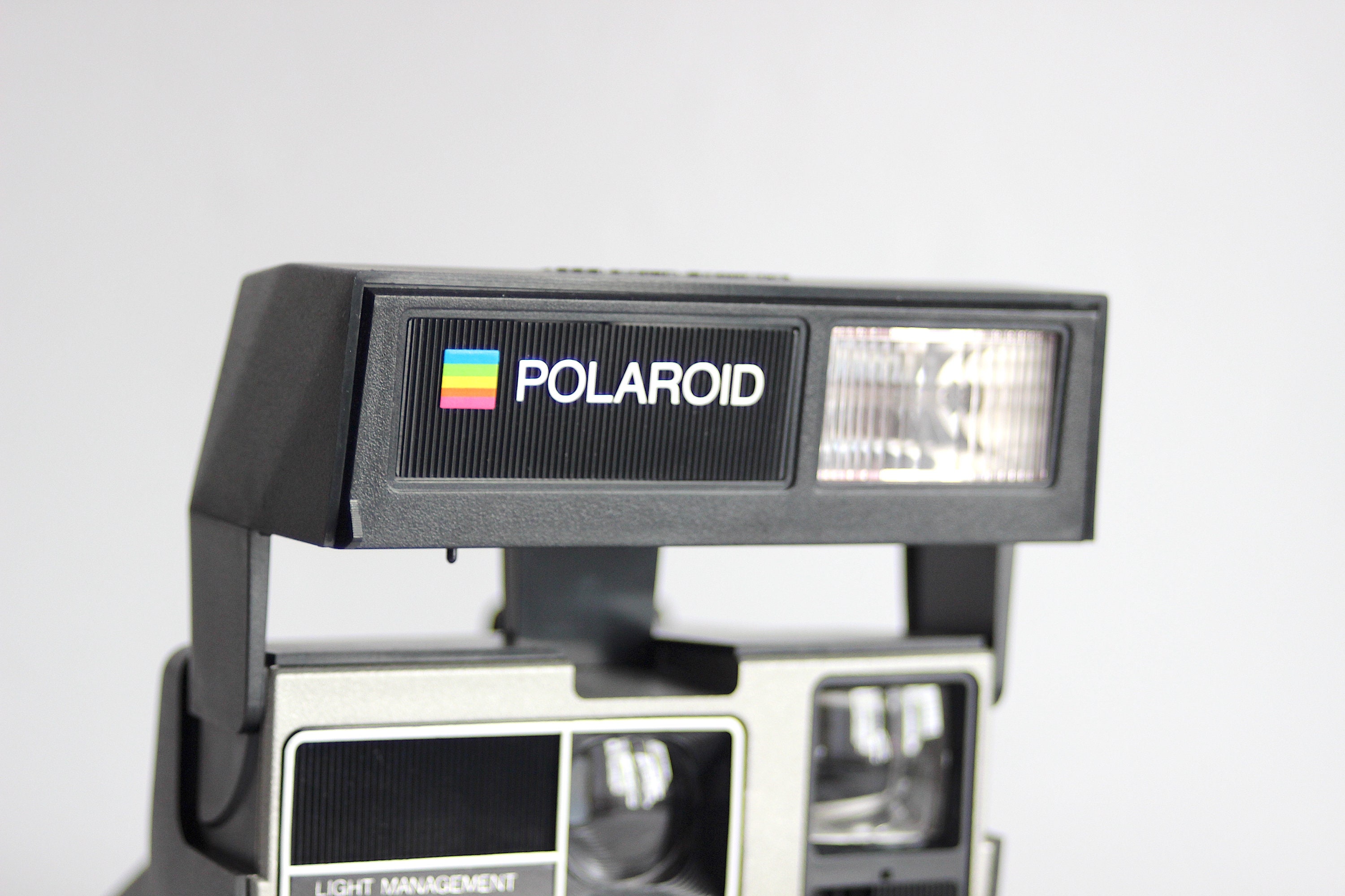 Polaroid Sun 600 LMS Appareil Photo Instantané – Série 600 Vintage avec Système de Gestion de la Lumière