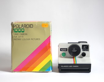 Polaroid 1000 Land Cámera - green shutter button [includes original box and original book instruccions]
