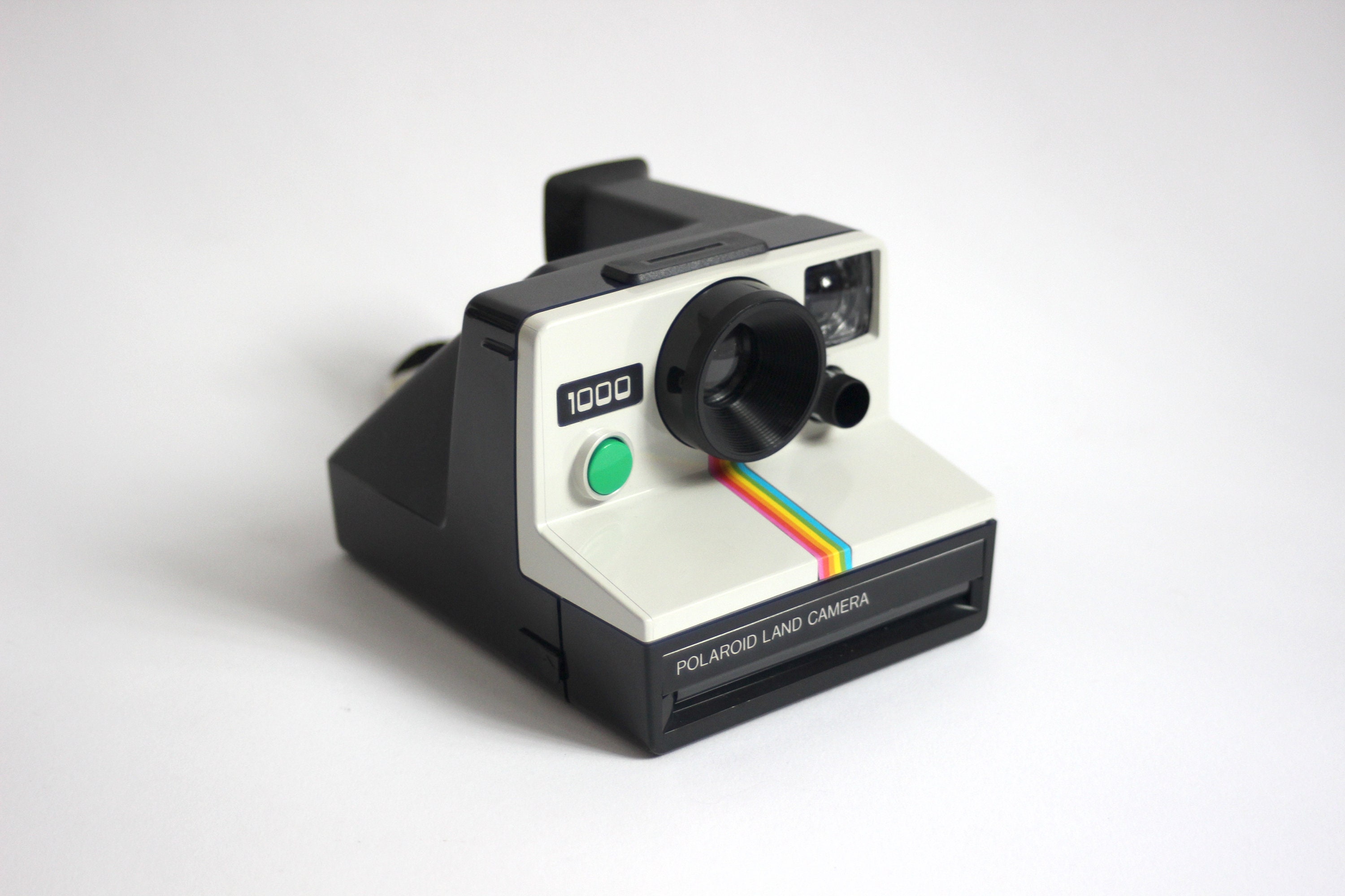 Polaroid 1000 Land Cámera - Green Shutter Button [includes