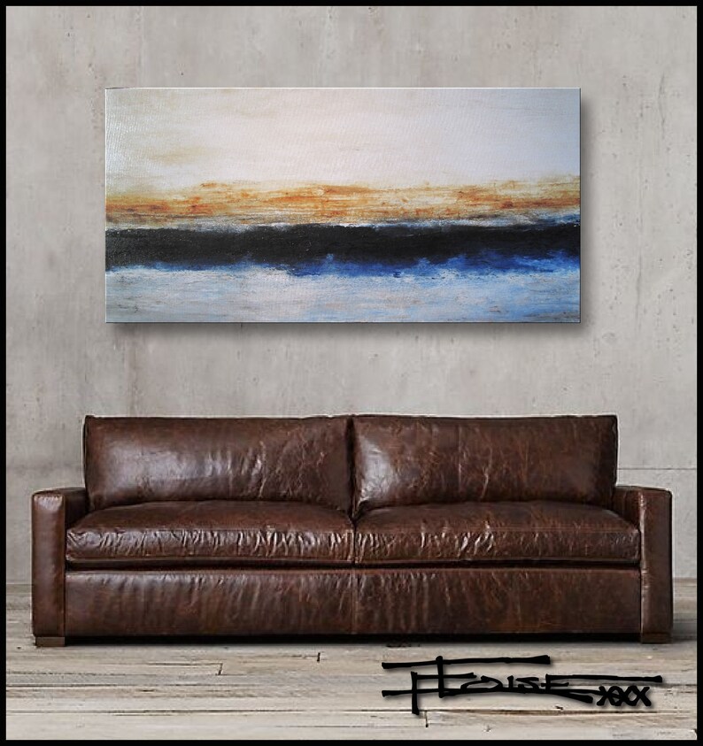 May include: Abstract painting of a seascape with a blue and black wave against a white and orange background. The painting is hanging on a wall above a brown leather sofa.