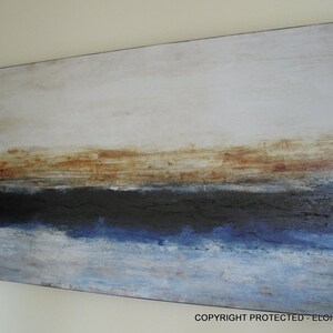 May include: Abstract painting with a horizontal composition. The painting features a light brown, beige, and white background with a dark blue and black horizontal stripe in the middle. The bottom of the painting is a light blue and white color.