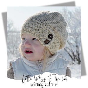 May include: A child wearing a beige knitted hat with two brown buttons. The hat has a unique design with a folded brim. The child is wearing a white vest and is standing in a snowy landscape. The text "Little Miss Ella hat knitting pattern" is written below the image.