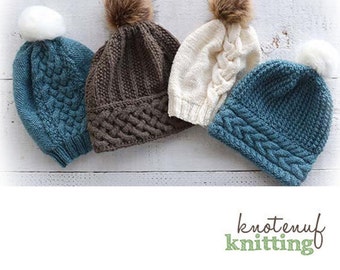 May include: Four knitted hats with pom-poms in brown, white, blue, and teal with a braided pattern. The hats are arranged on a white wooden surface. The text "knotenuf knitting" is at the bottom of the image.