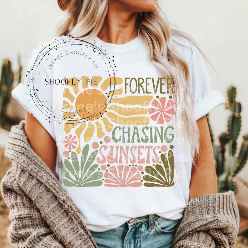 May include: White t-shirt with a graphic design featuring a sun, flowers, and the text "Forever Chasing Sunsets".