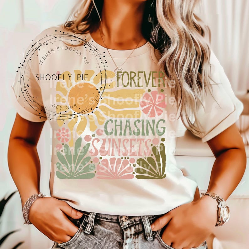 May include: A white t-shirt with a graphic design featuring a sun, flowers, and palm leaves. The text "Forever Chasing Sunsets" is printed on the shirt.