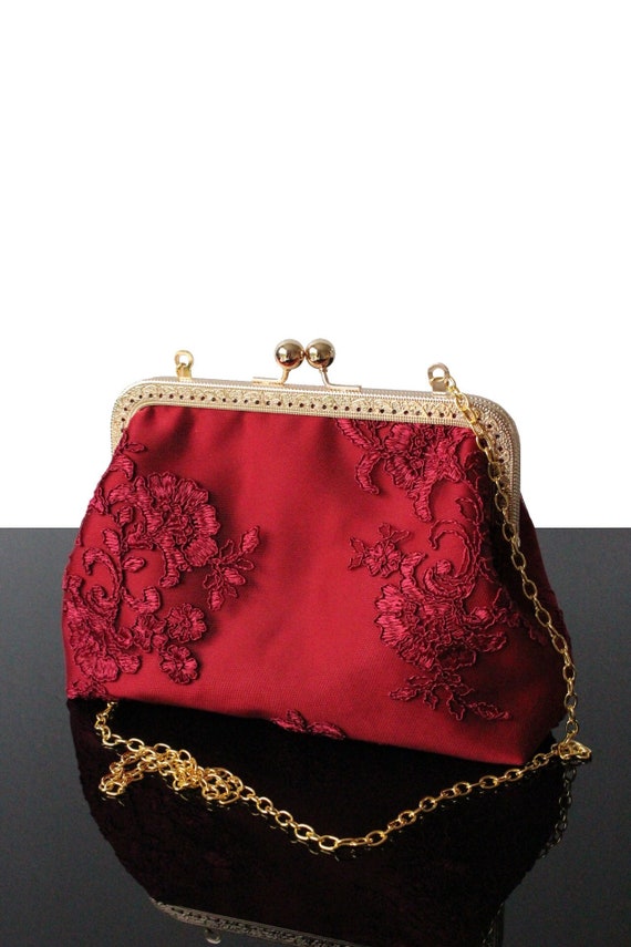 Burgundy red hotsell clutch bag