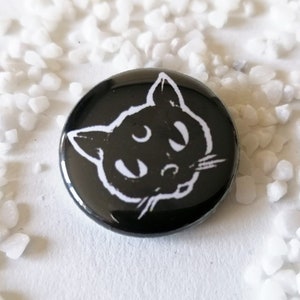 Button black Cat Bild 1