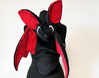 Mochila de murciélago - rojo/negro/ojos de dibujos animados