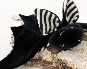 Cuddly Comfort Bat (black and white, striped)