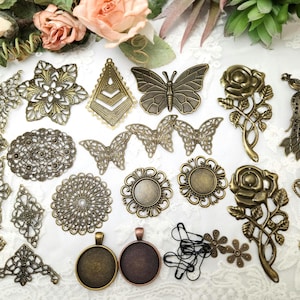 May include: An assortment of antique brass-toned metal embellishments, including filigree shapes, butterflies, roses, and peacock designs. Also included are round bezel settings and floral accents, perfect for jewelry making and crafting projects.