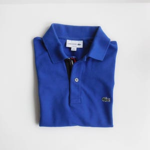 Polo LACOSTE mixte.