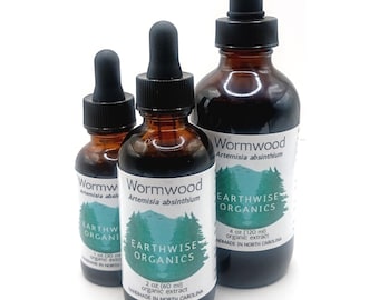 May include: Three amber glass bottles of Wormwood organic extract with black droppers. The bottles have white labels with green tree graphics and the text "Earthwise Organics". Sizes are 1 oz, 2 oz (60 ml), and 4 oz (120 ml).