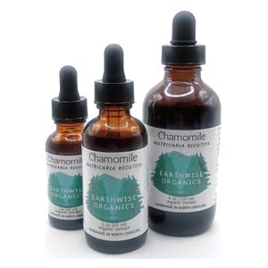 May include: Three amber glass bottles of Chamomile organic extract with black droppers. The bottles are labeled with the text "Chamomile Matricaria Recutita" and "Earthwise Organics". The sizes are 1 oz (30 ml), 2 oz (60 ml), and 4 oz (120 ml).