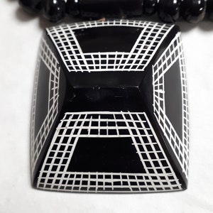 Horn necklace, pendant, ethnic motif, black and white, Marion Godart, Paris design
