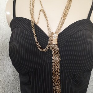 CAVALLI, JUST CAVALLI necklace, goldtone metal, chains and the eponymous name.....couture jewelry.