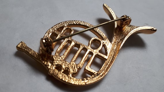 FRENCH HORN brooch, goldtone metal with clear rhi… - image 8