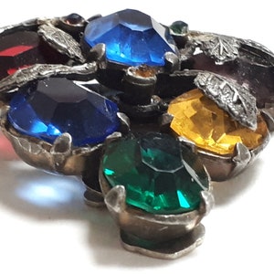 Dress clip, forties, pot metal with huge facetted cabs, metal leaves Pat Pend