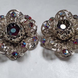 SARAH COVENTRY earrings, huge, goldtone with AB rhinestones, floral motif, signed, patent pend.