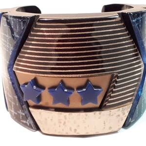 JEAN MARIE POINOT cuff bangle, blue, gold and copper, stars, stripes, laminated acrylic, rare.