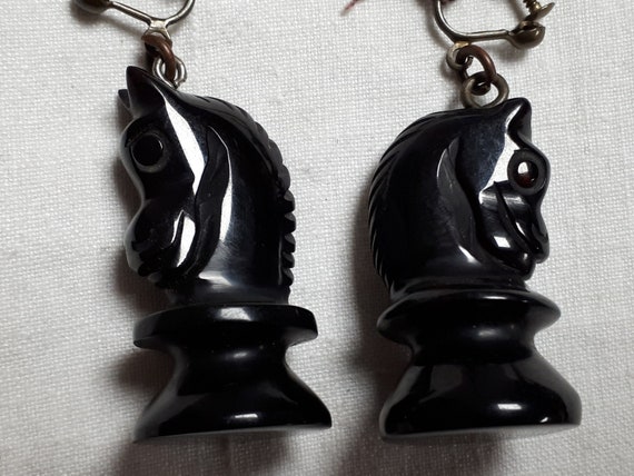 Black carved bakelite CHESS clipback earrings, ho… - image 1