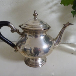 ANTIQUE teapot, solid brass, silver-plated, ebony handle