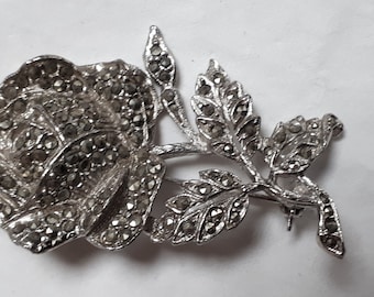 Rose brooch silvertone metal with marcasites