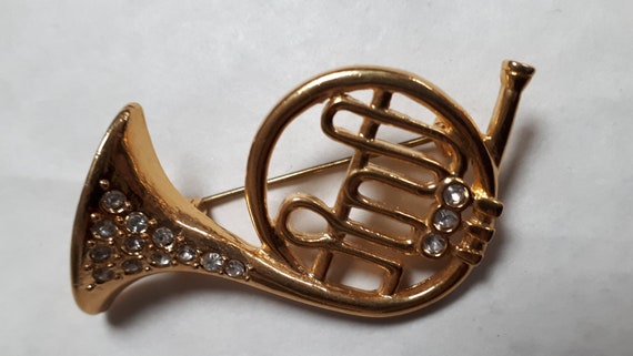 FRENCH HORN brooch, goldtone metal with clear rhi… - image 1