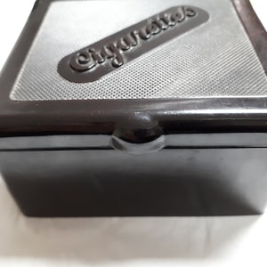 BLACK BAKELITE cigarette box, deep, marked DUPERITE, art deco, excellent condition.