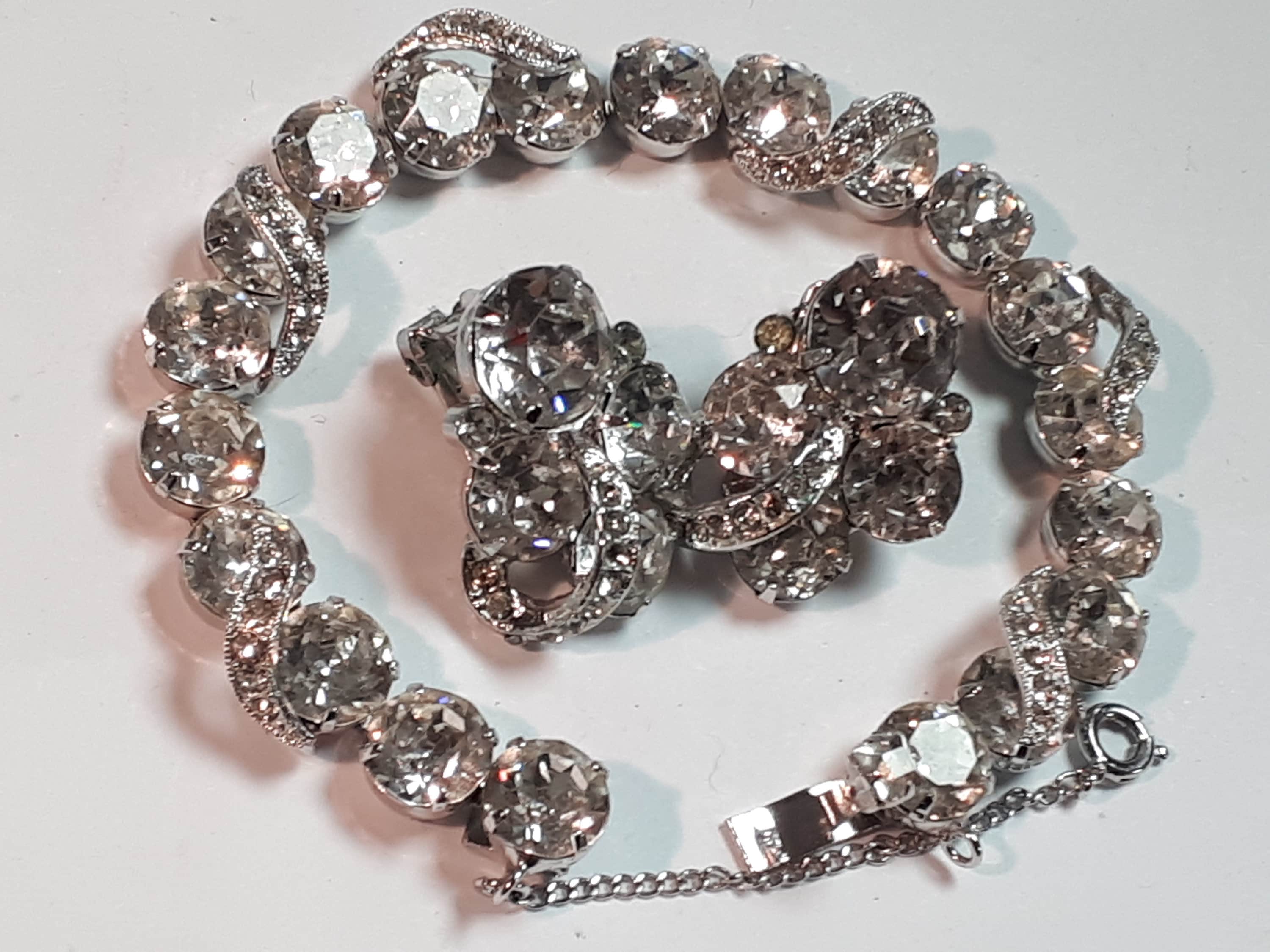 EISENBERG bracelet and earrings, clear rhinestones, signed all pces, rhodium plated