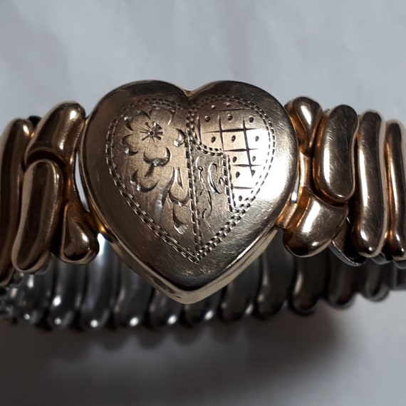 Girl's stretch bracelet, 10 K gold filled on stee… - image 1