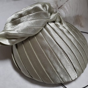 COCKTAIL hat, pale green satin, white ostrich feathers, designer Jasmin Rizvi