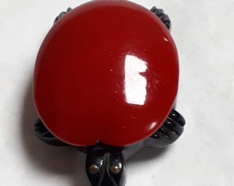 BAKELITE turtle dress clip, VINTAGE, red and black, detailed carving