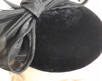 FASCINATOR black velvet with big black gauzy bow, quality piece, old stock, unworn.