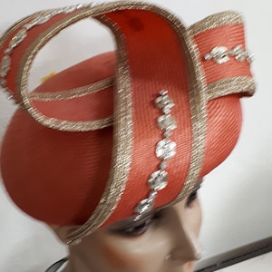 Vintage Mr John hat, orange straw with gold trim,
