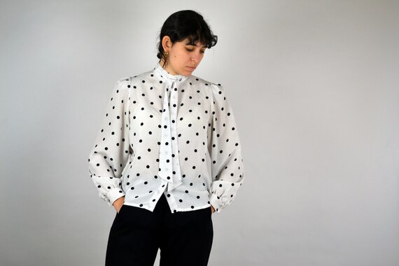 black and white polka dot blouse with bow