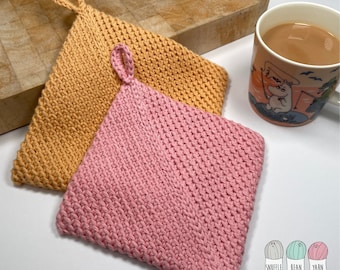 May include: Two crocheted pot holders, one in a light orange color and one in a pink color. The pot holders are made with a simple stitch pattern and have a loop for hanging.