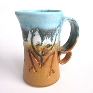 Mug-ceramic mug-ceramic tea mug: colors gloss green, white and mat mustard ceramic glazes outside-mug wheel thrown with Coqui and Sun