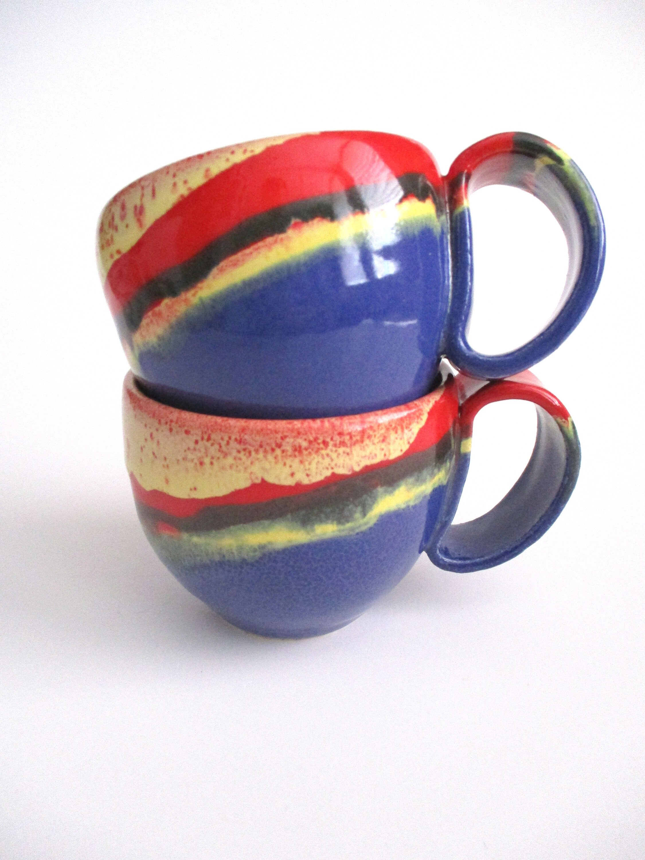 Tazza da tè o da caffè con doppio piattino blu e rossa