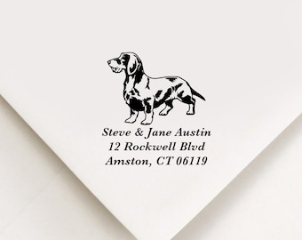 May include: Black and white silhouette of a dachshund dog with the text "Steve & Jane Austin, 12 Rockwell Blvd, Amston, CT 06119" below.