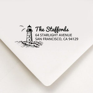 May include: Black and white illustration of a lighthouse with birds flying overhead and waves crashing below. The text "The Staffords" is above the lighthouse, and the address "64 Starlight Avenue, San Francisco, CA 94129" is below.