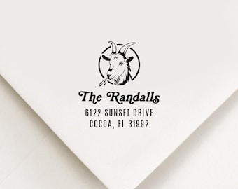 May include: Black and white return address stamp featuring a goat's head in a circle with the text "The Randalls" and the address "6122 Sunset Drive Cocoa, FL 31992".