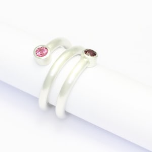 Coiles ring Duet - tourmaline and rhodolite