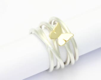 Coiled ring silver with butterfly of yellow gold