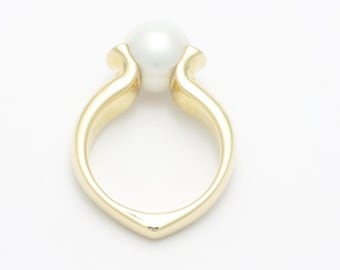 South Sea pearl meets yellow gold