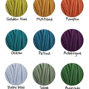 May include: Nine balls of yarn in different colours, including golden kiwi, mustard, pumpkin, ocean, petrol, aubergine, baby blue, sage, and avocado.