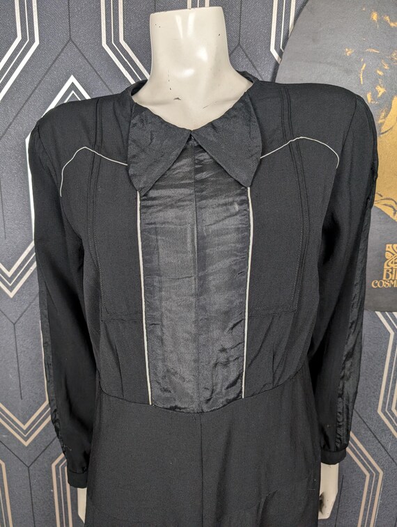 Late 1920’s to early 1930’s drop waist sheer dress with ruffles down the skirt that have yellow trim, size small excellent condition