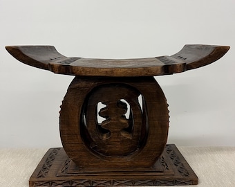 Small Ashanti style carved bench stool